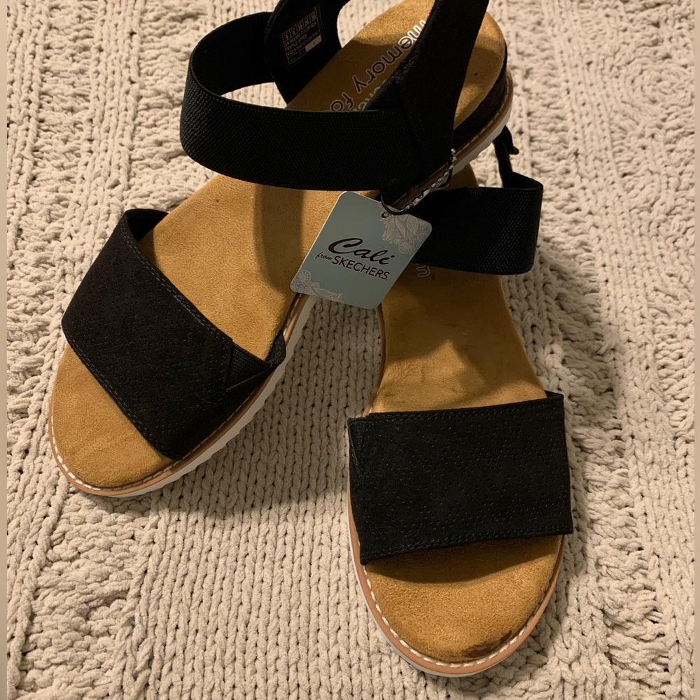 Black Skechers sandals